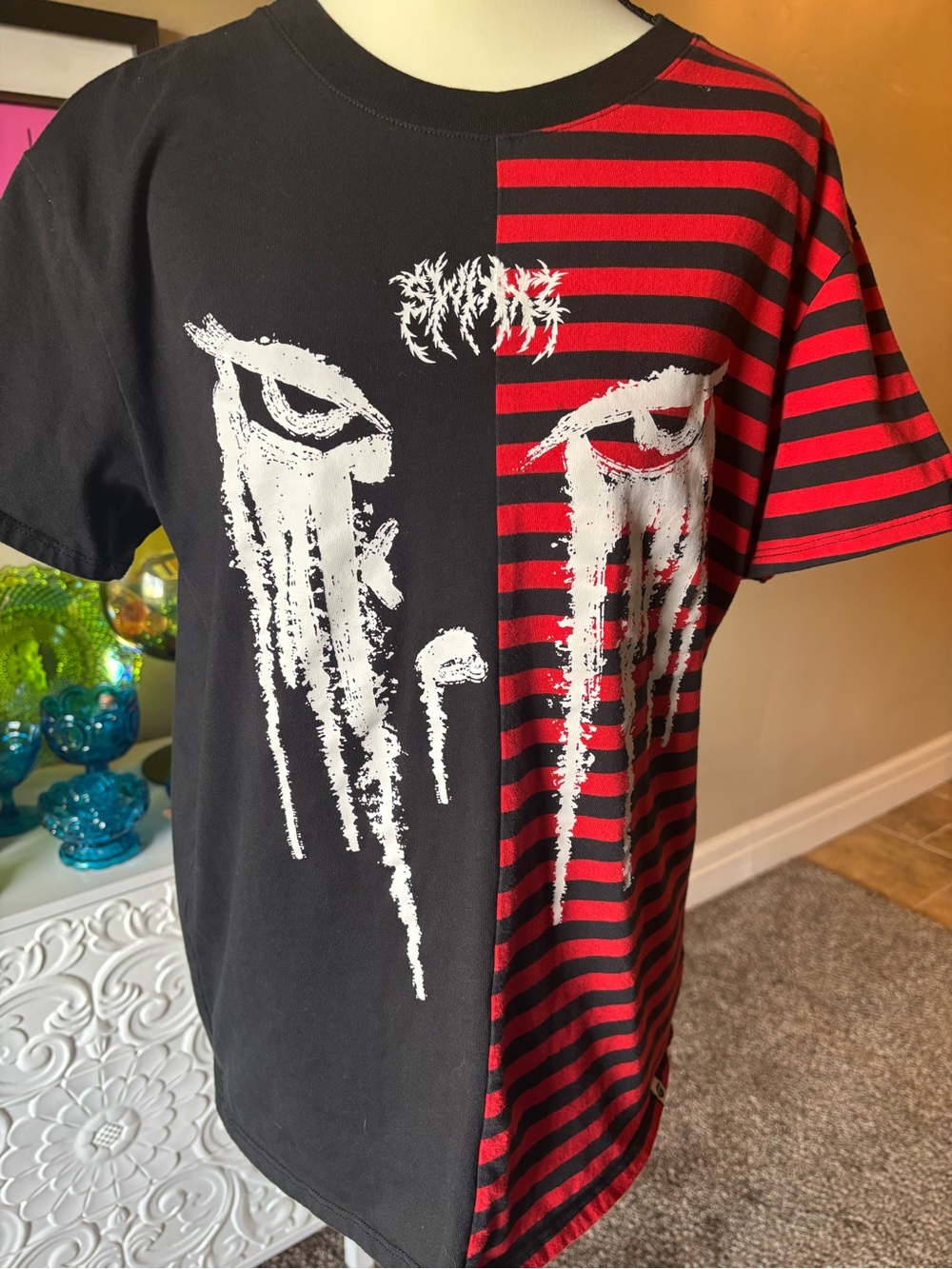 SWIXXZ Split Black and Red Striped Graphic Tee with White Drip Eyes